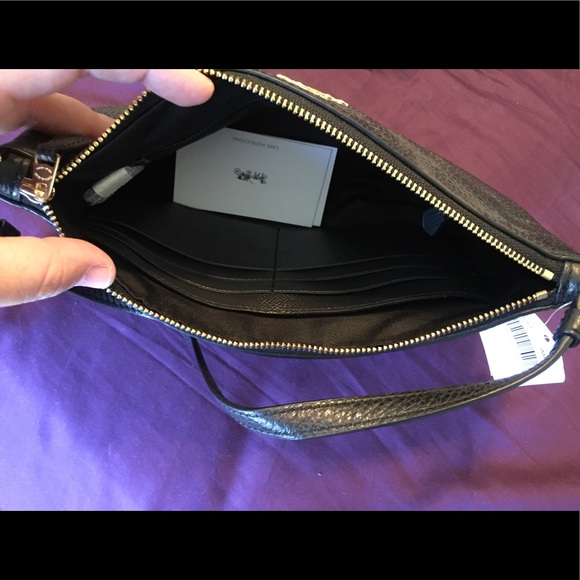 Coach black leather clutch/wristlet
